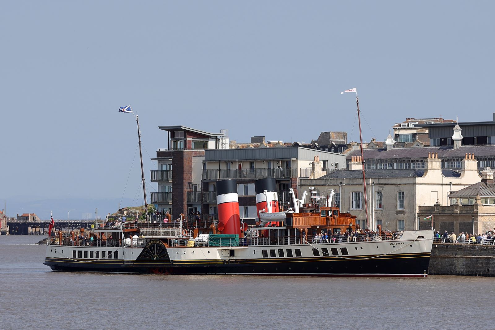 A large paddle steamer coming in to dock